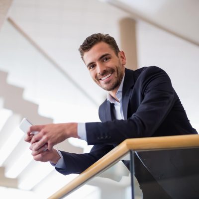 businessman-holding-mobile-phone-2021-08-28-18-10-37-utc.jpg businessman-holding-mobile-phone-2021-08-28-18-10-37-utc.jpg