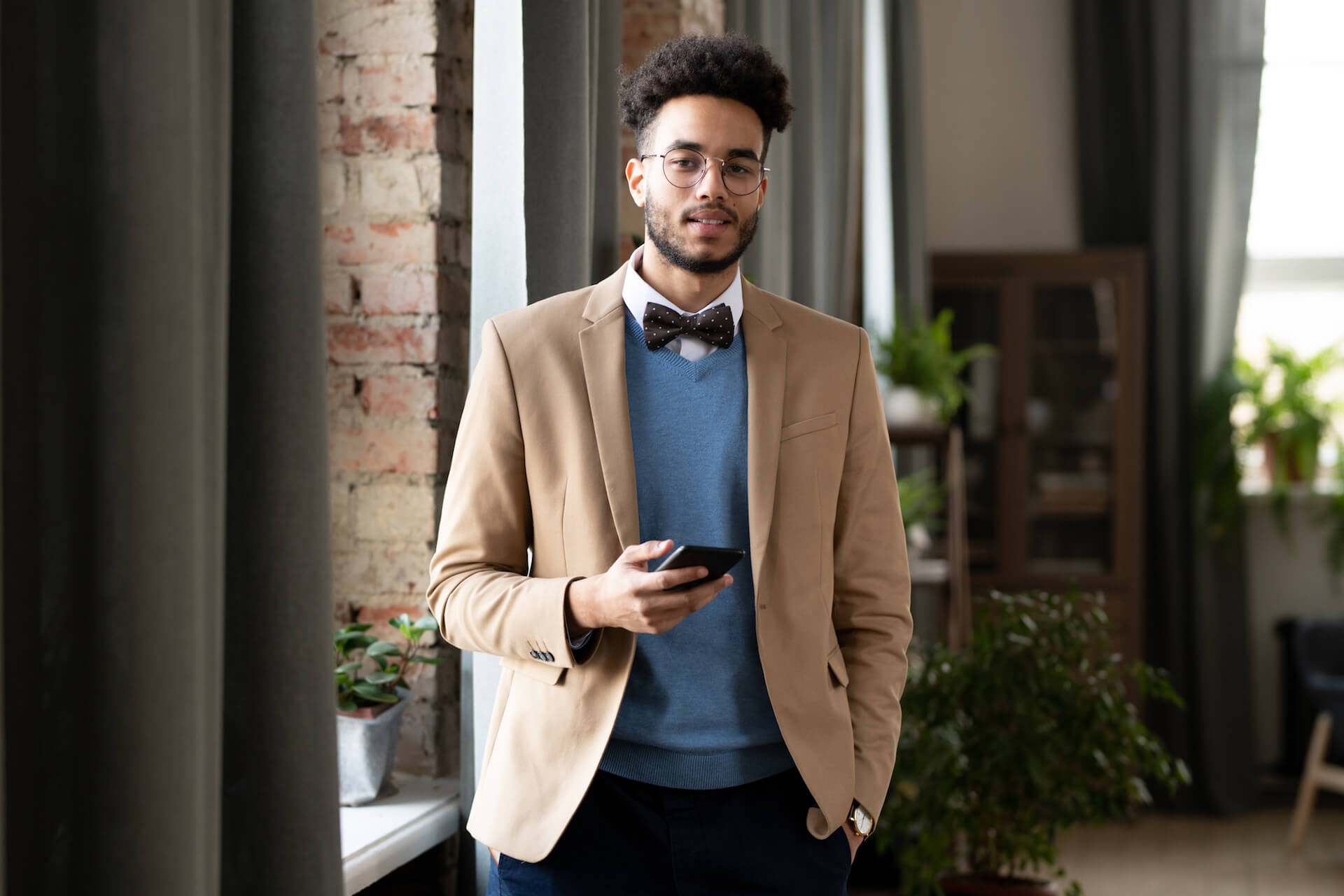 businessman-with-mobile-phone-2021-09-24-03-19-07-utc.jpg